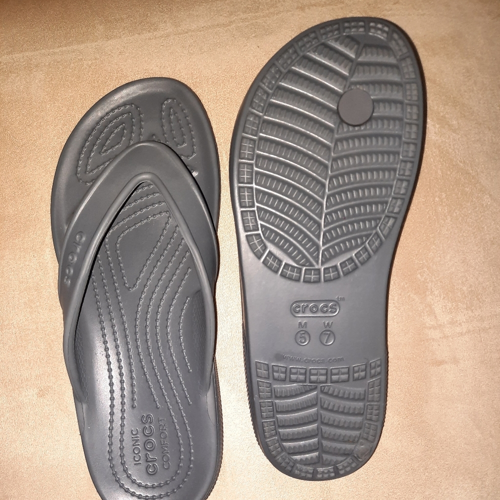 BRAND NEW CROCS Flip flop style